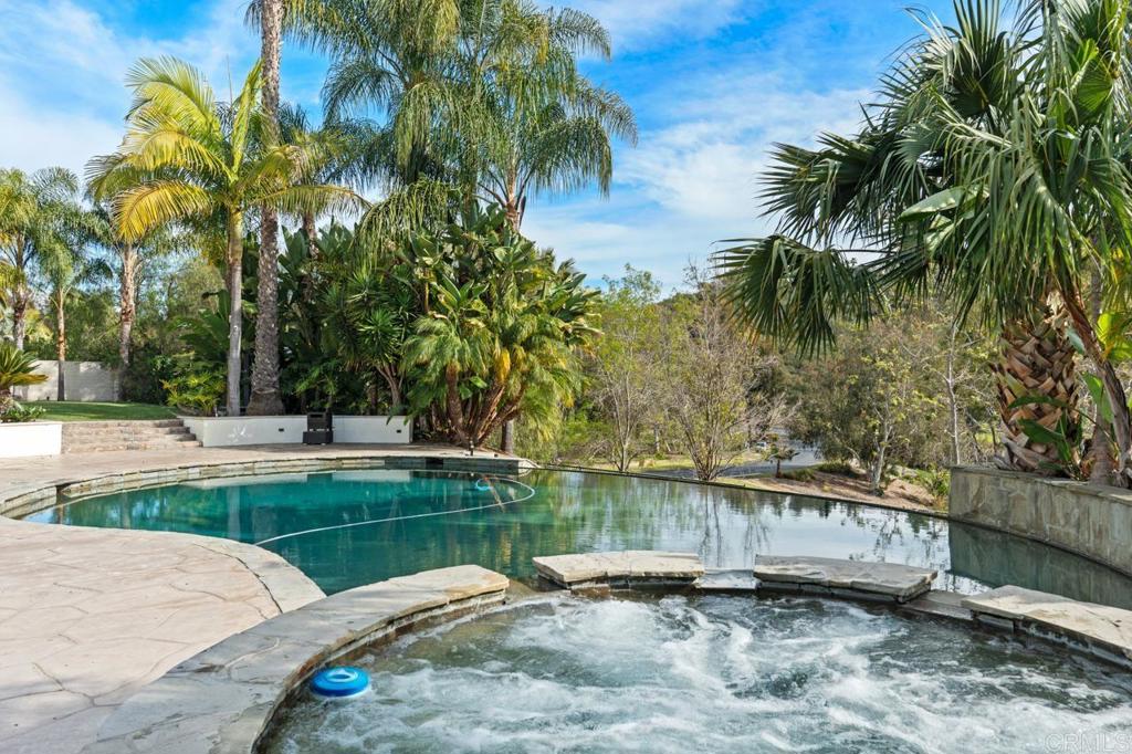 6773 Poco Lago Rancho Santa Fe, CA 92067 - Photo 57 of 65 a backyard of a house with lots of green space