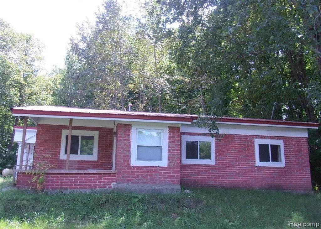 3819 Webster Road Elmira, MI 49730 - Photo 1 of 2 7090695912 Front view.jpg
