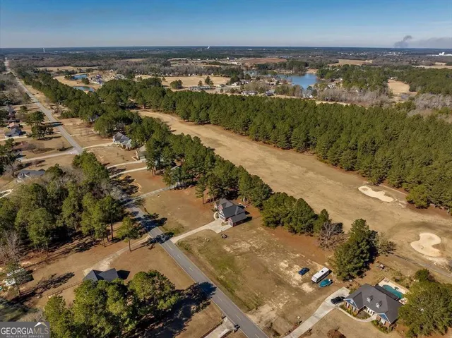 a view of a town with mountains in the background