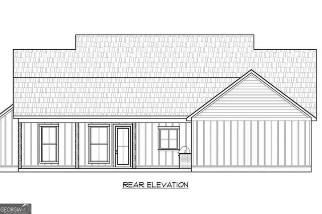 a black and white photo of a living room