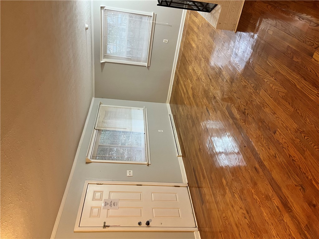 207 Pine Lane Anderson, SC 29621 - Photo 3 of 13 This interior showcases rich hardwood flooring, inviting warmth into the living space.