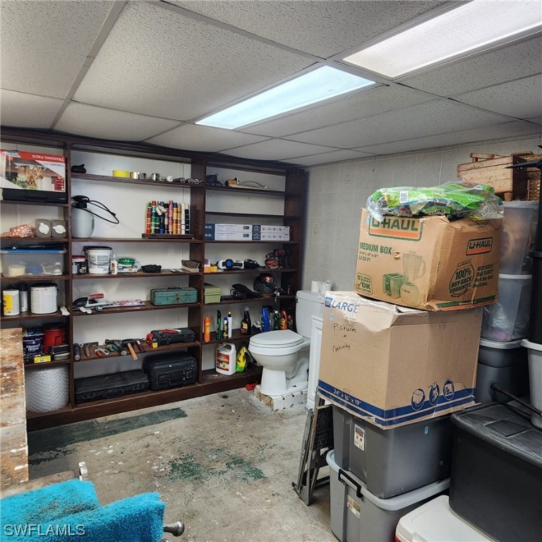 302 Pinecrest Avenue Moore Haven, FL 33471 - Photo 11 of 17 a room with furniture a rug and a potted plant