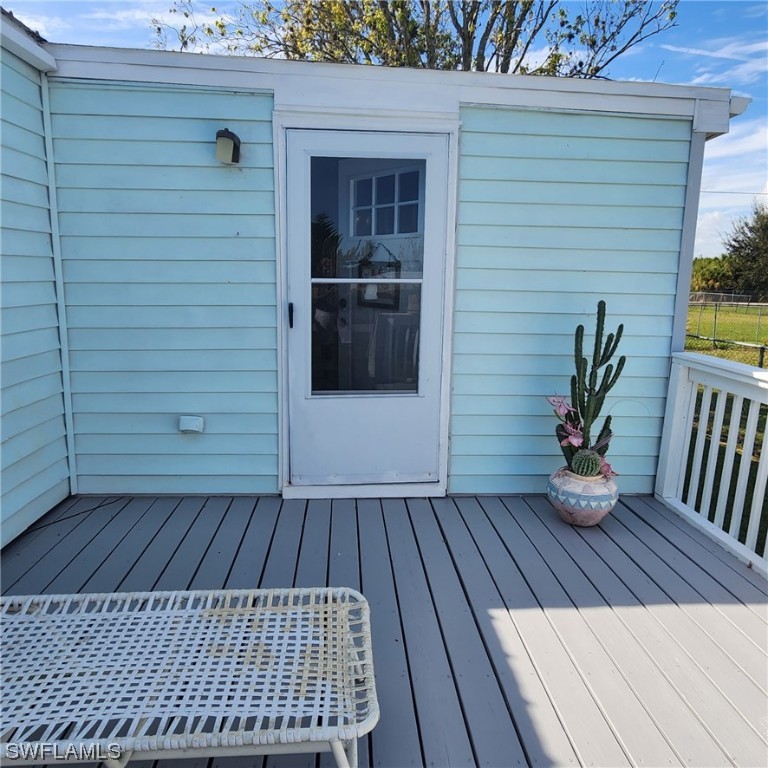 302 Pinecrest Avenue Moore Haven, FL 33471 - Photo 4 of 17 a view of outdoor space with a deck