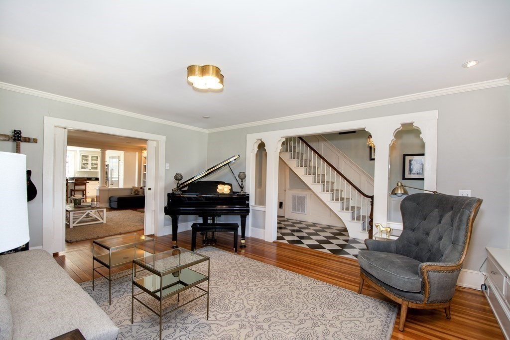 17 Gannett Road Scituate, MA 02066 - Photo 19 of 36 a living room with furniture and a piano