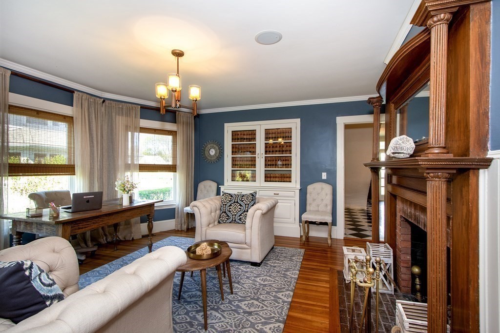 17 Gannett Road Scituate, MA 02066 - Photo 21 of 36 a living room with fireplace furniture and a window