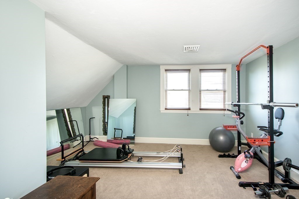 17 Gannett Road Scituate, MA 02066 - Photo 30 of 36 a room with table chairs and windows