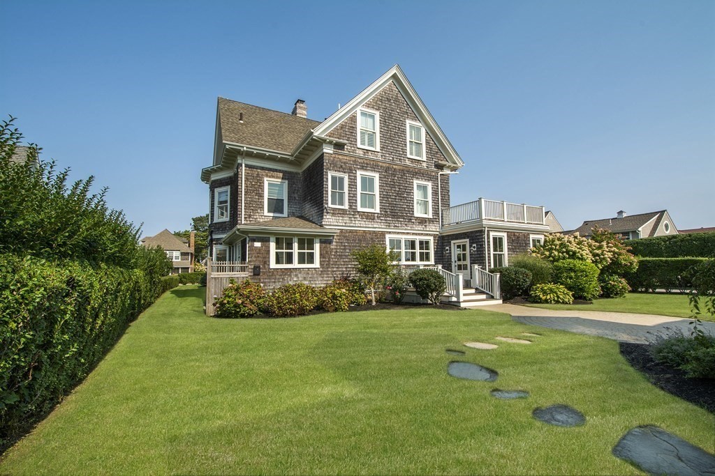 17 Gannett Road Scituate, MA 02066 - Photo 4 of 36 a front view of a house with a yard