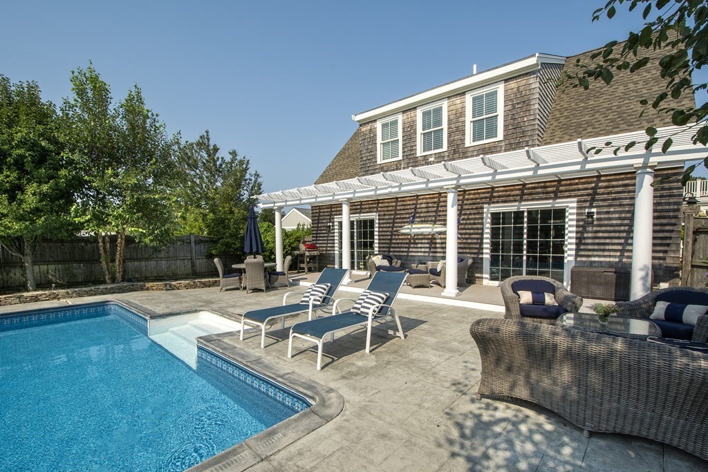 17 Gannett Road Scituate, MA 02066 - Photo 6 of 36 a view of a house with swimming pool and sitting area