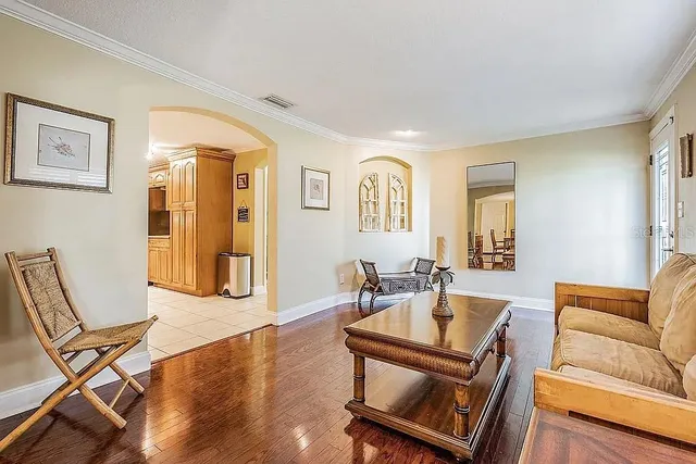 a view of a entryway with furniture and a refrigerator
