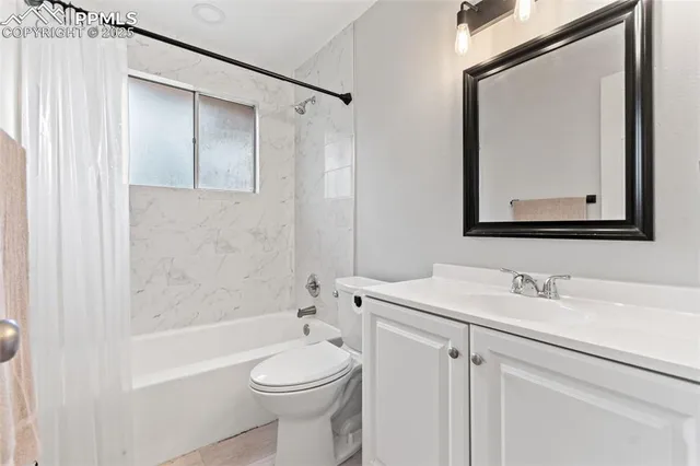 a room with furniture and a window