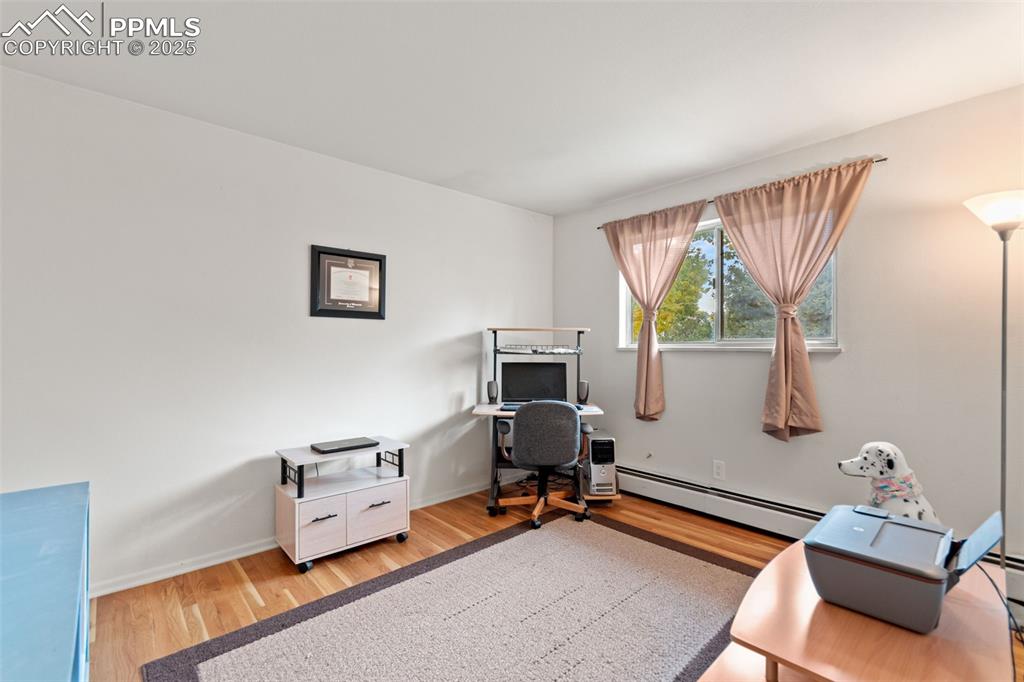 2801 South Reed Street Denver, CO 80227 - Photo 24 of 44 a room with furniture and a window