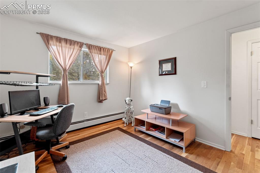 2801 South Reed Street Denver, CO 80227 - Photo 25 of 44 a bedroom with a workspace