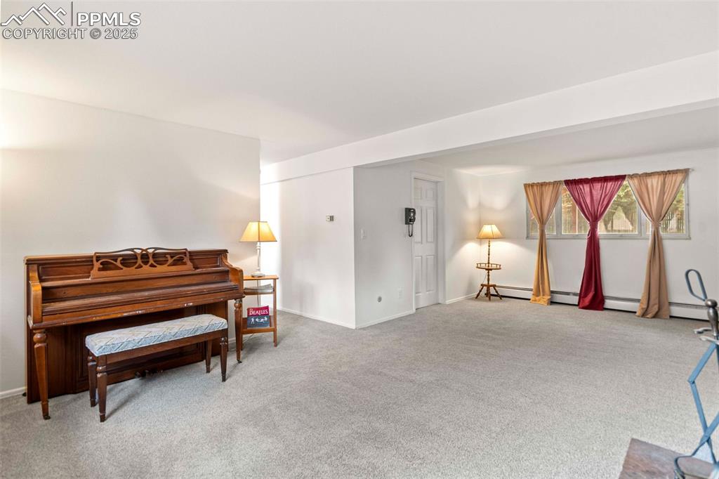 2801 South Reed Street Denver, CO 80227 - Photo 28 of 44 a view of a room with furniture and a window