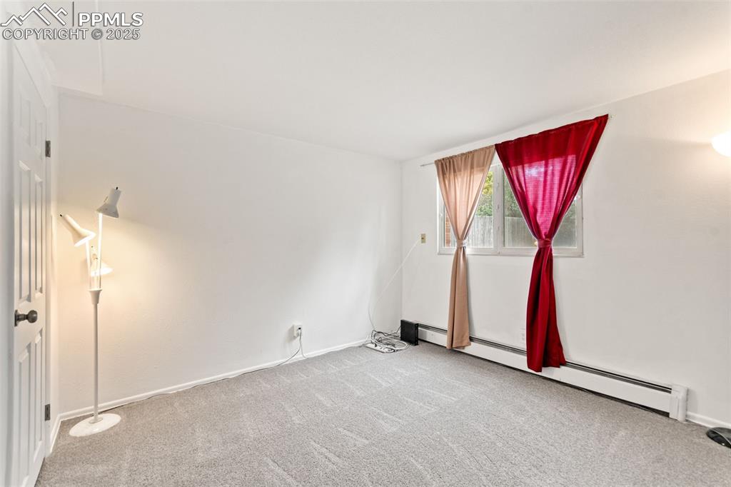 2801 South Reed Street Denver, CO 80227 - Photo 34 of 44 an empty room with windows