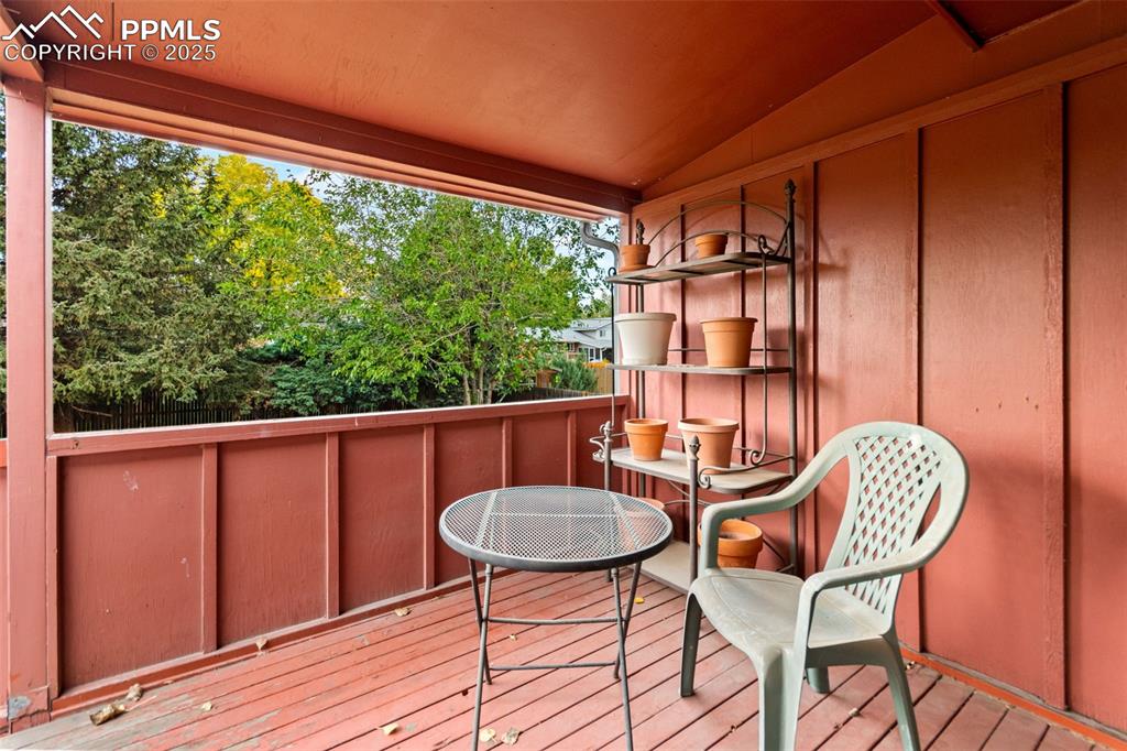 2801 South Reed Street Denver, CO 80227 - Photo 35 of 44 a balcony view with two chairs and a table