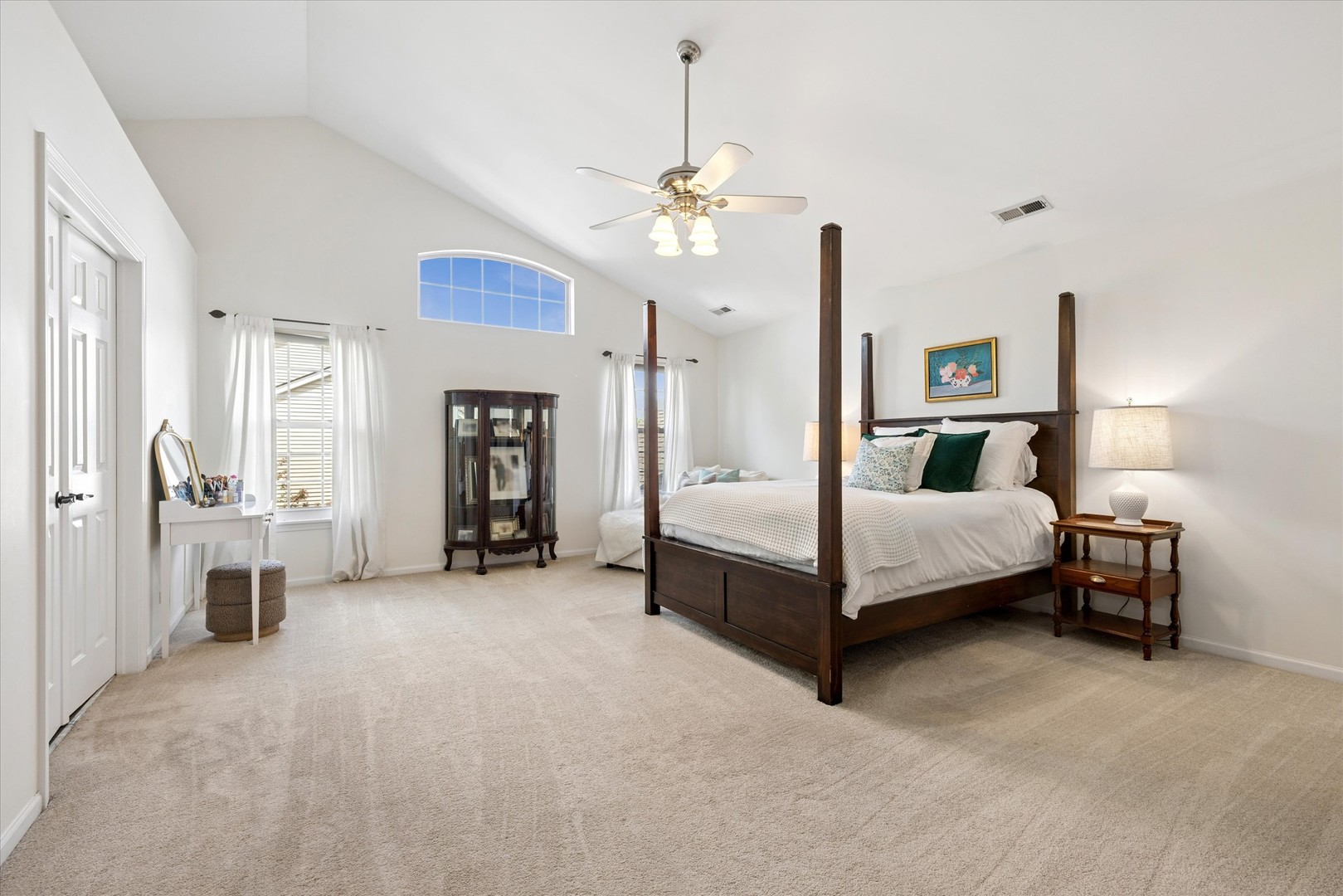 340 Tenby Way Algonquin, IL 60102 - Photo 21 of 36 a bedroom with a bed and a chandelier