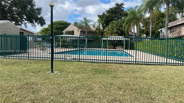 a view of a street with a building in the background