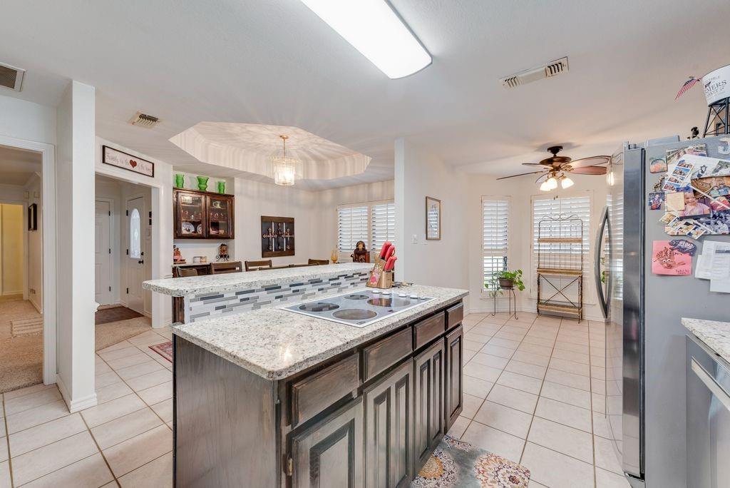 579 South Hitt Street Boyd, TX 76023 - Photo 18 of 34 Amazing Kitchen with Breakfast Bar! Granite Countertops and more!