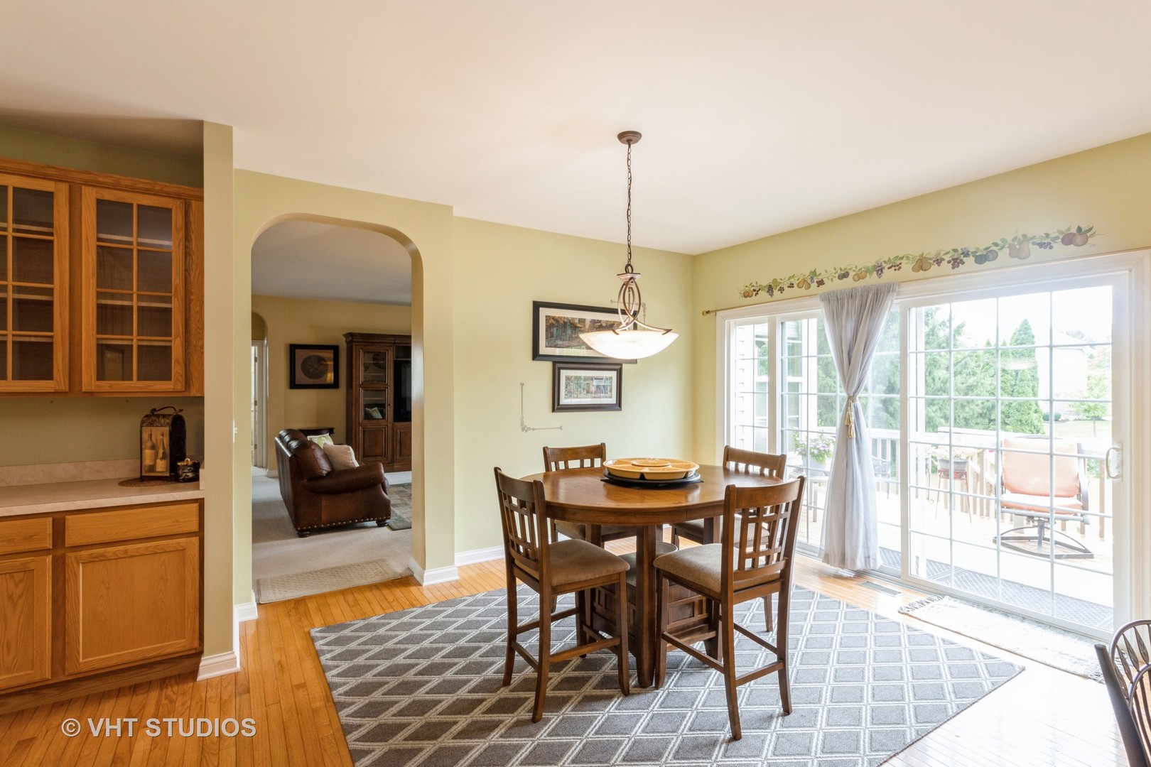 210 Bridle Path Lane Fox River Grove, IL 60021 - Photo 9 of 17 a view of a dining room with furniture window and outside view
