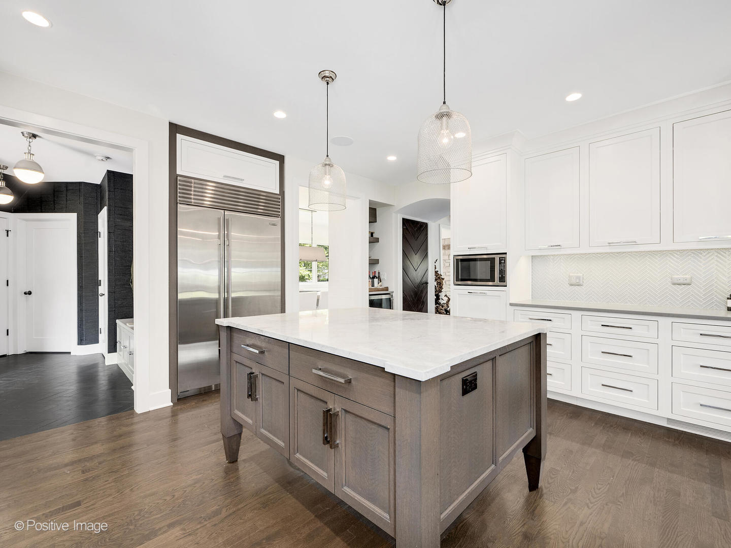 300 Forest Road Hinsdale, IL 60521 - Photo 15 of 43 a kitchen with white cabinets and sink