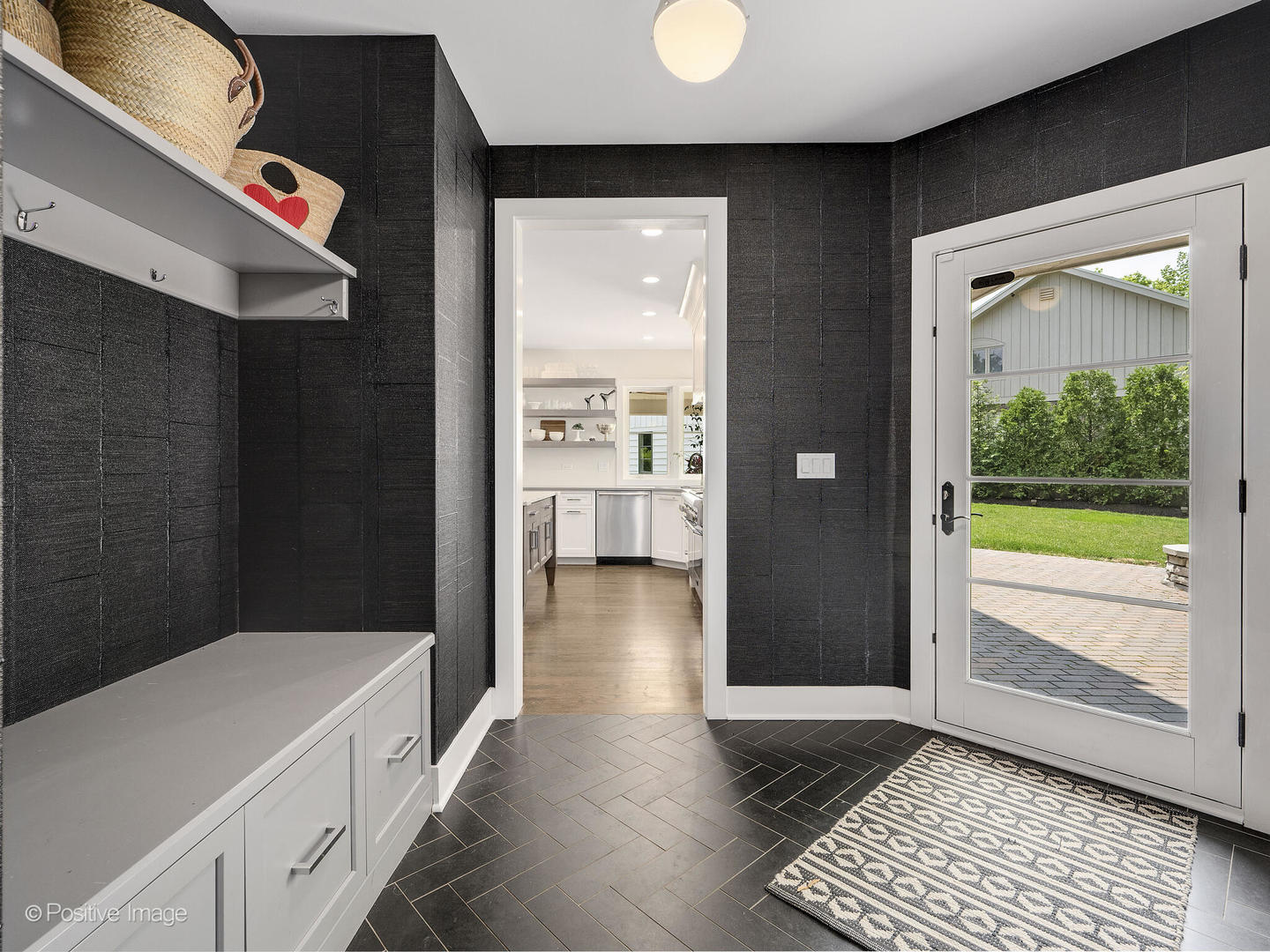 300 Forest Road Hinsdale, IL 60521 - Photo 19 of 43 a view of a hallway with wooden floor and a bathroom
