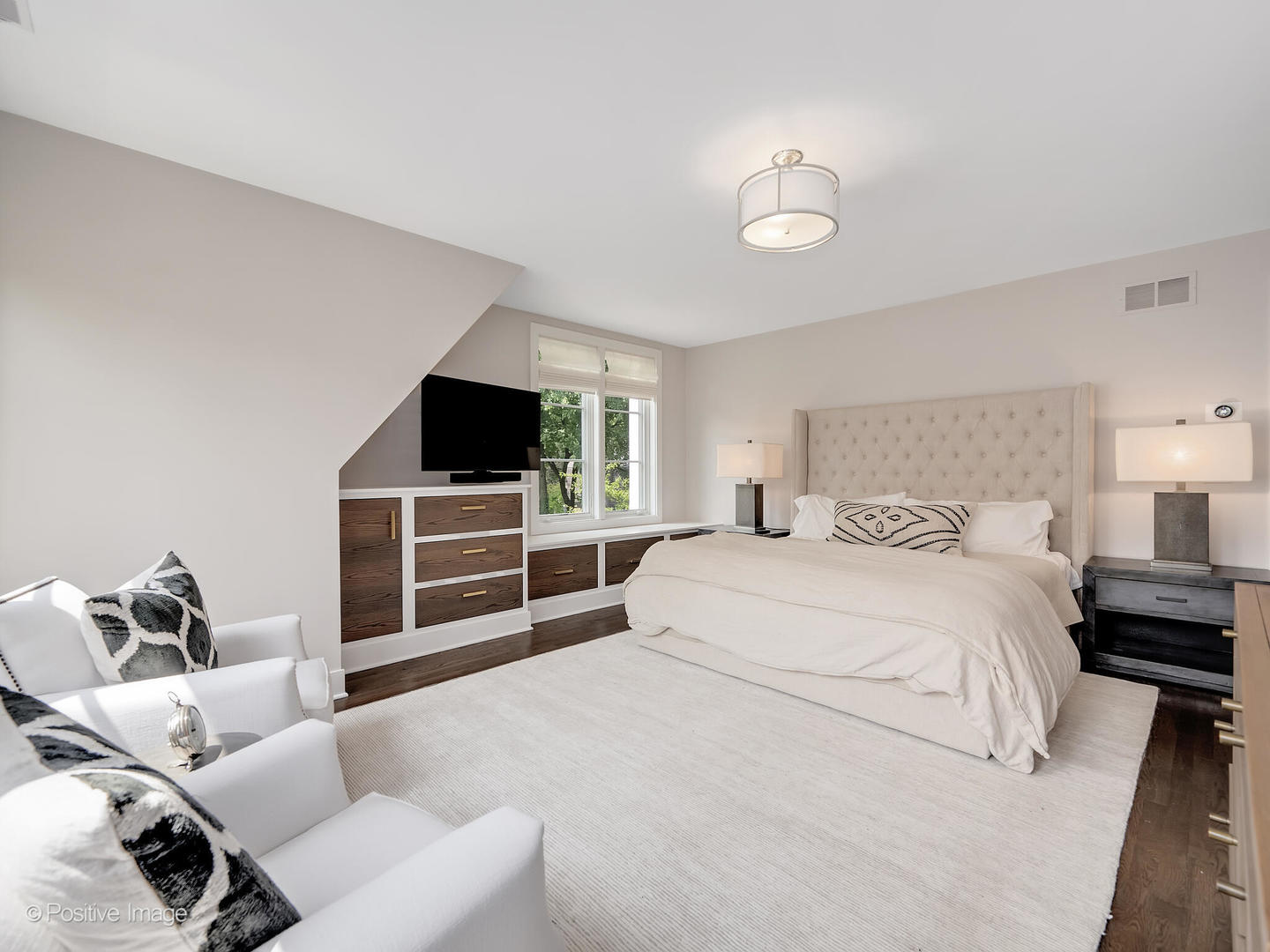 300 Forest Road Hinsdale, IL 60521 - Photo 22 of 43 a spacious bedroom with a bed and a television