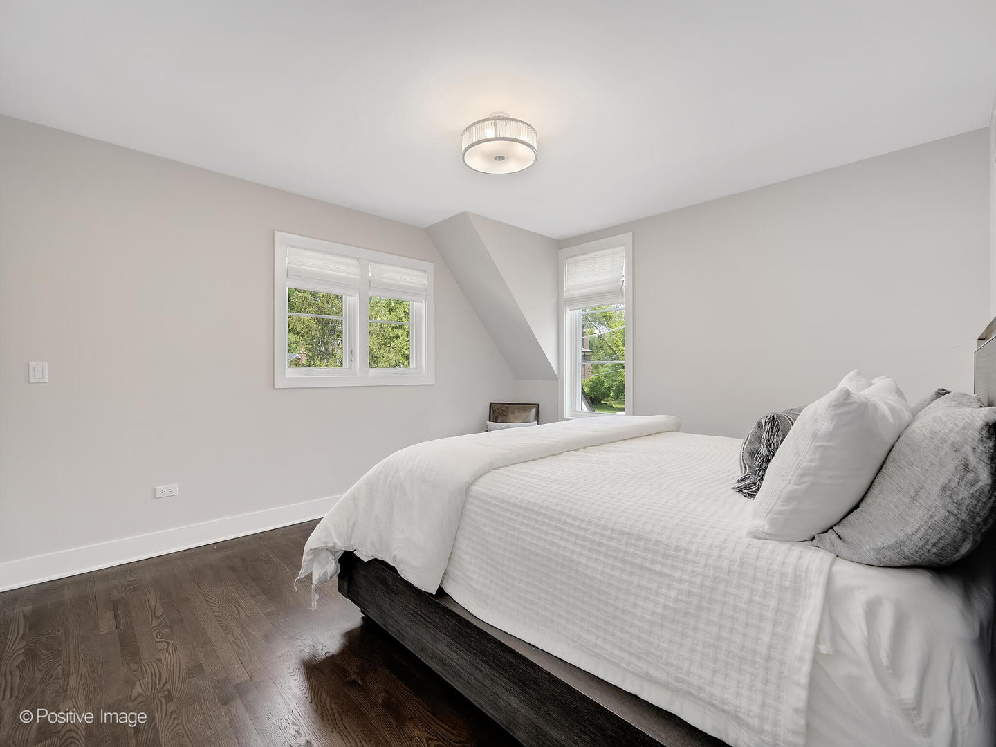 300 Forest Road Hinsdale, IL 60521 - Photo 25 of 43 a bedroom with a bed and a window