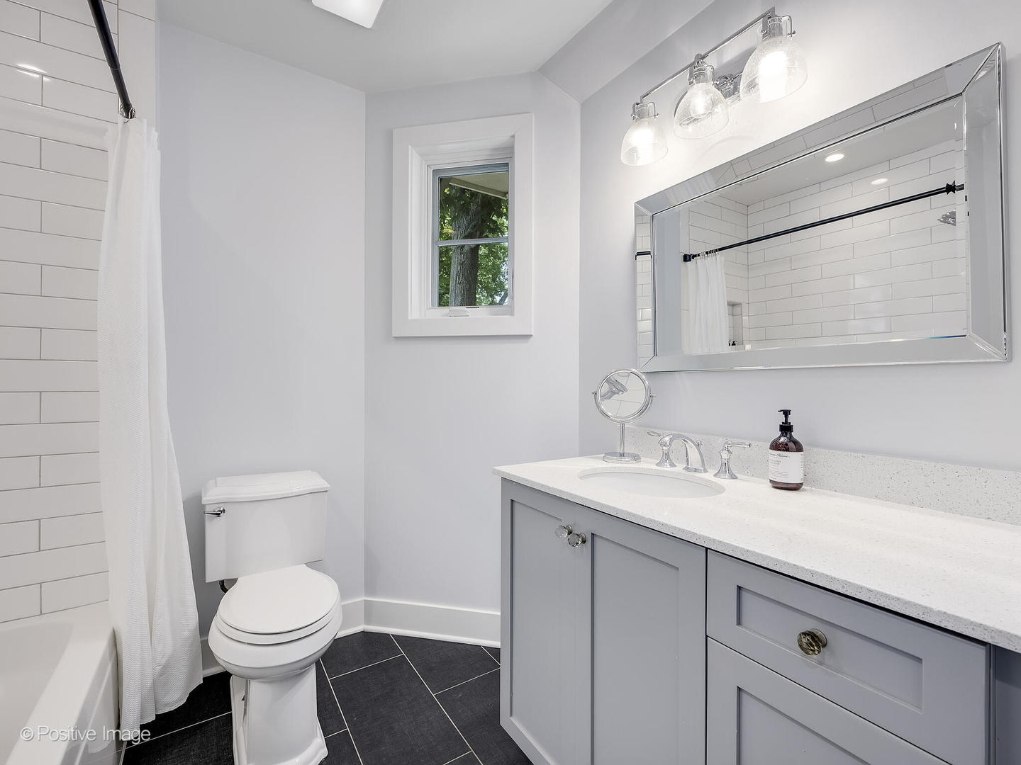 300 Forest Road Hinsdale, IL 60521 - Photo 26 of 43 a bathroom with a toilet sink and mirror