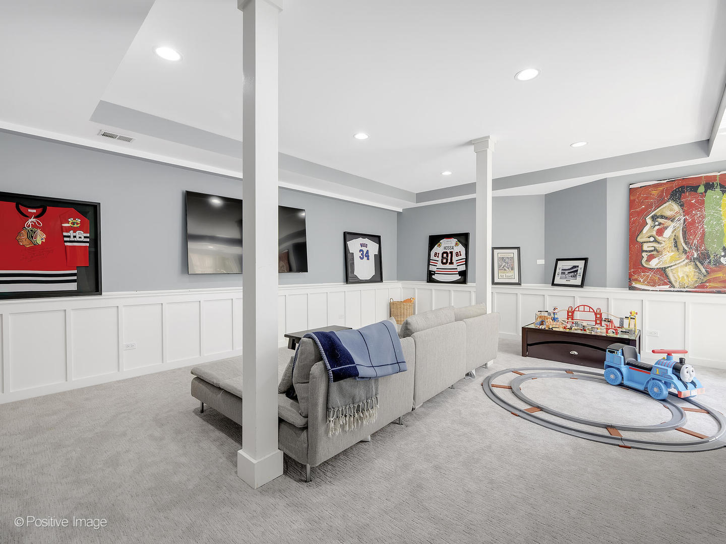 300 Forest Road Hinsdale, IL 60521 - Photo 32 of 43 a living room with furniture and a flat screen tv