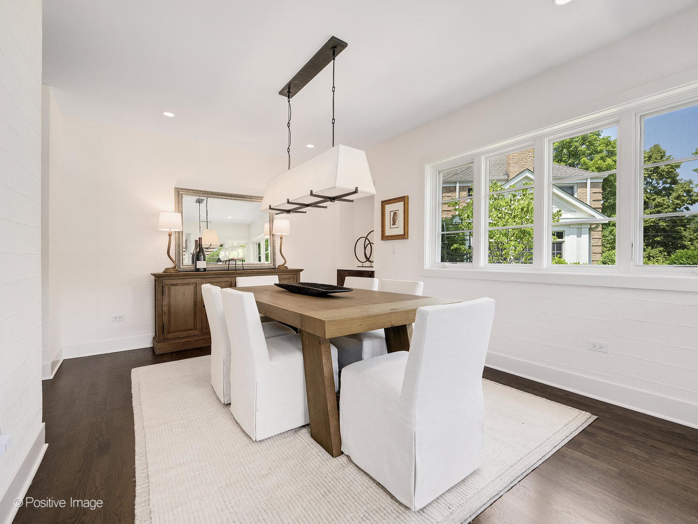 300 Forest Road Hinsdale, IL 60521 - Photo 5 of 43 a kitchen with a table chairs and a large window