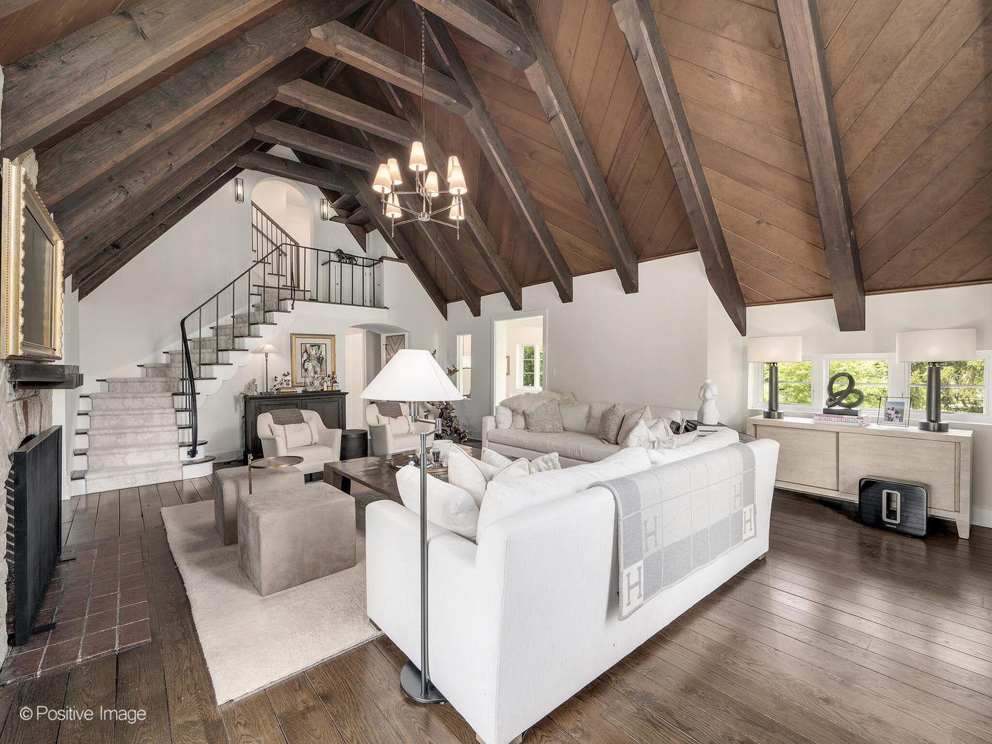300 Forest Road Hinsdale, IL 60521 - Photo 8 of 43 a living room with furniture and a chandelier
