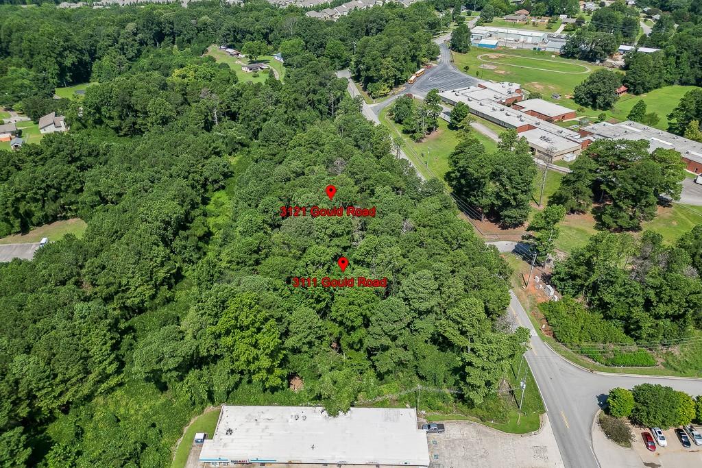 3111 Gould Road Gainesville, GA 30504 - Photo 6 of 9 an aerial view of residential house with outdoor space and trees all around