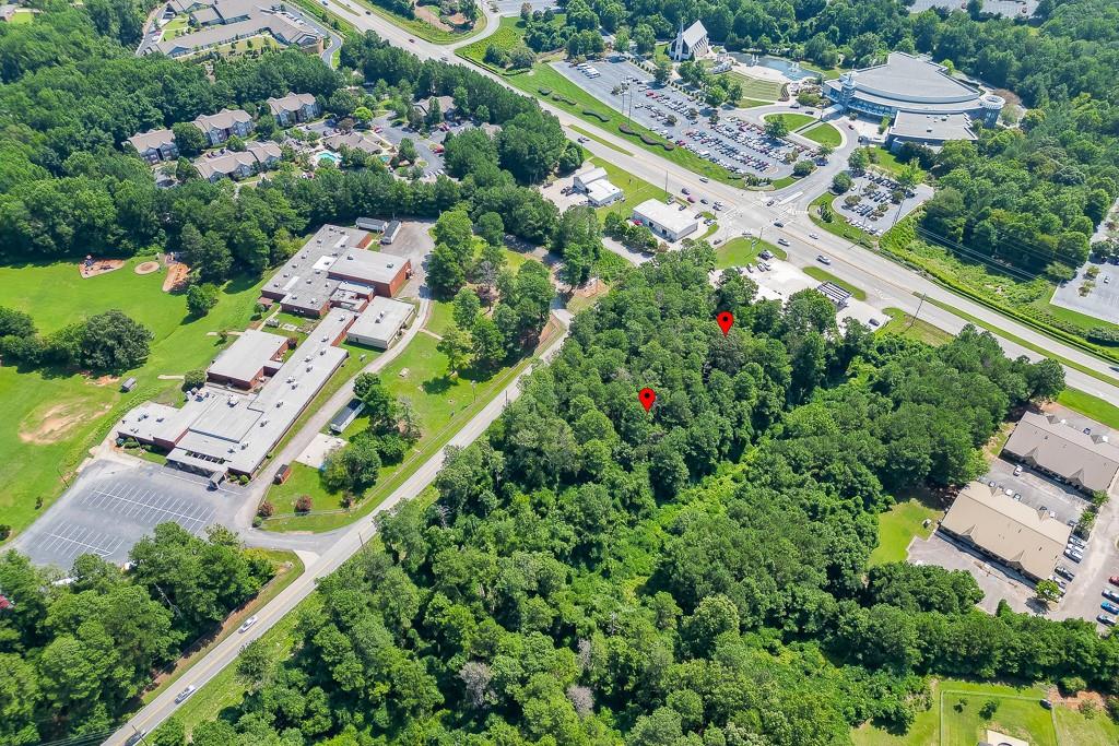 3111 Gould Road Gainesville, GA 30504 - Photo 7 of 9 an aerial view of residential houses with outdoor space and trees all around