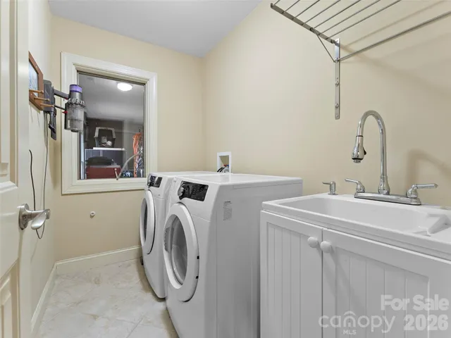a kitchen with stainless steel appliances granite countertop cabinets and window