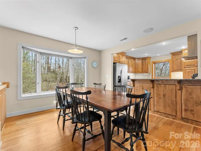a kitchen with a stove and cabinets