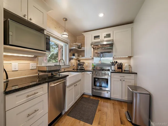 a view of a city with mountains in the background