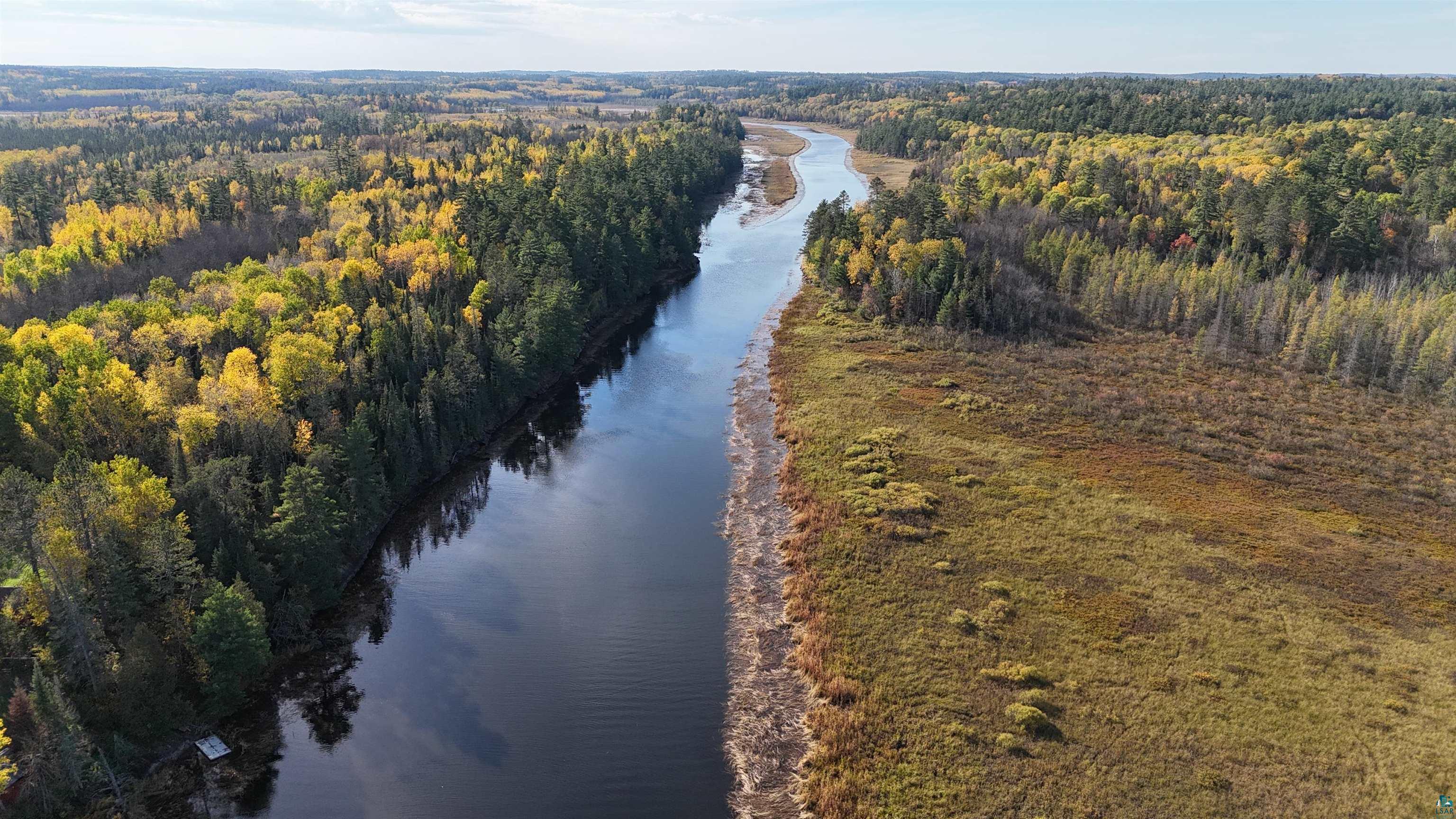 7178 Gold Mine Road Orr, MN 55771 - Photo 9 of 36 Bird's eye view of a nearby body of water and a heavily wooded area