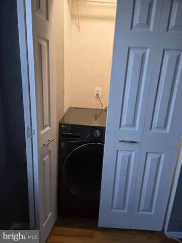 a view of a storage and utility room in a kitchen