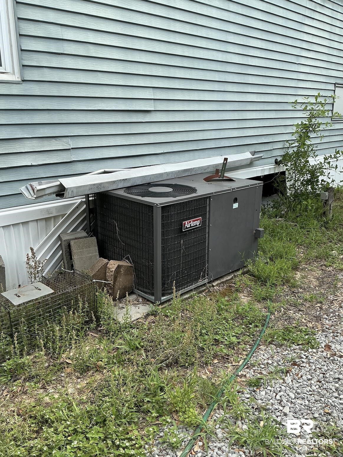84 Horn Drive Lillian, AL 36549 - Photo 14 of 24 Exterior view of cooling unit