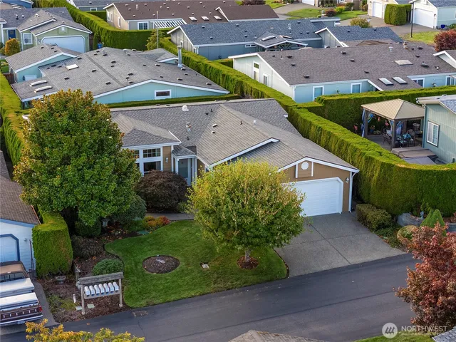 an aerial view of a house with a garden