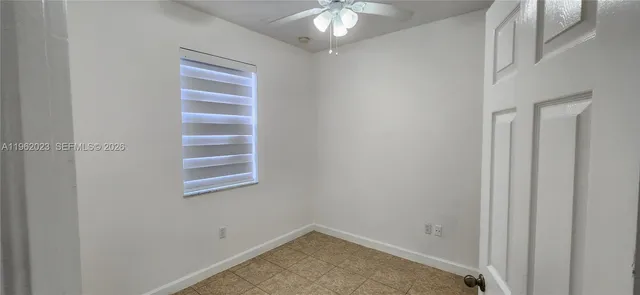 a view of a backyard with garden