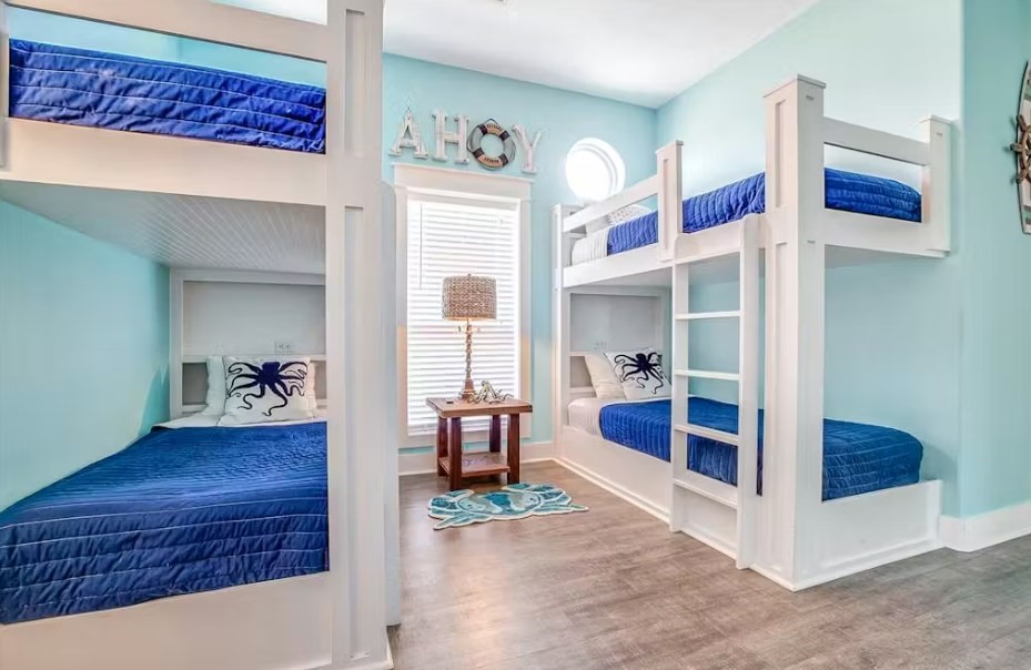 922 Palm Ridge Drive Crystal Beach, TX 77650 - Photo 12 of 17 a living room with furniture and a table