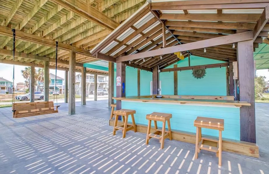 922 Palm Ridge Drive Crystal Beach, TX 77650 - Photo 16 of 17 a view of swimming pool with seating area