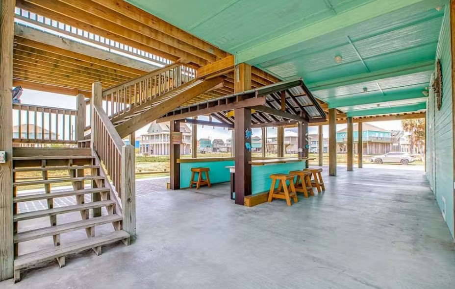 922 Palm Ridge Drive Crystal Beach, TX 77650 - Photo 17 of 17 a view of an empty room with a balcony
