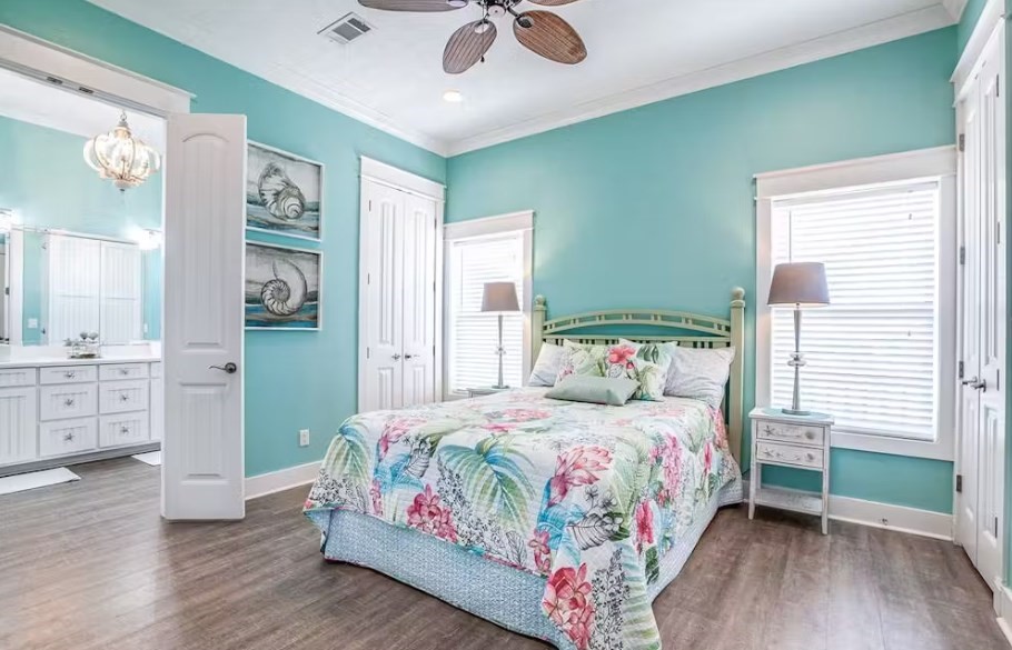 922 Palm Ridge Drive Crystal Beach, TX 77650 - Photo 7 of 17 a bedroom with a bed and a table