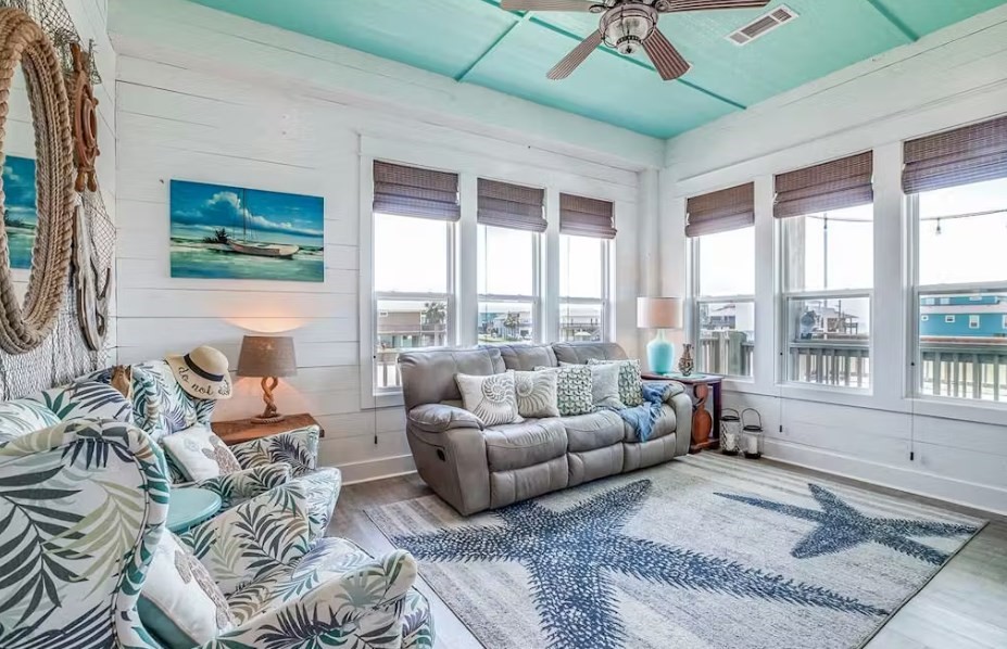 922 Palm Ridge Drive Crystal Beach, TX 77650 - Photo 10 of 17 a living room with furniture and a large window