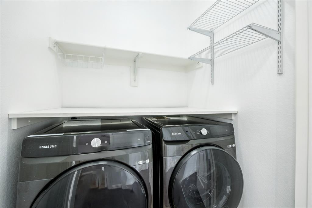 1503 Biltmore Lane Irving, TX 75063 - Photo 14 of 34 a utility room with dryer and washer