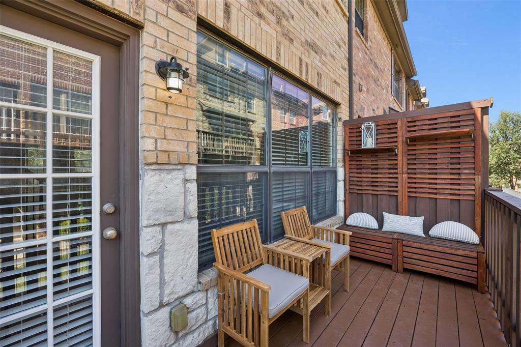 1503 Biltmore Lane Irving, TX 75063 - Photo 26 of 34 a view of a patio with couches chairs and wooden floor