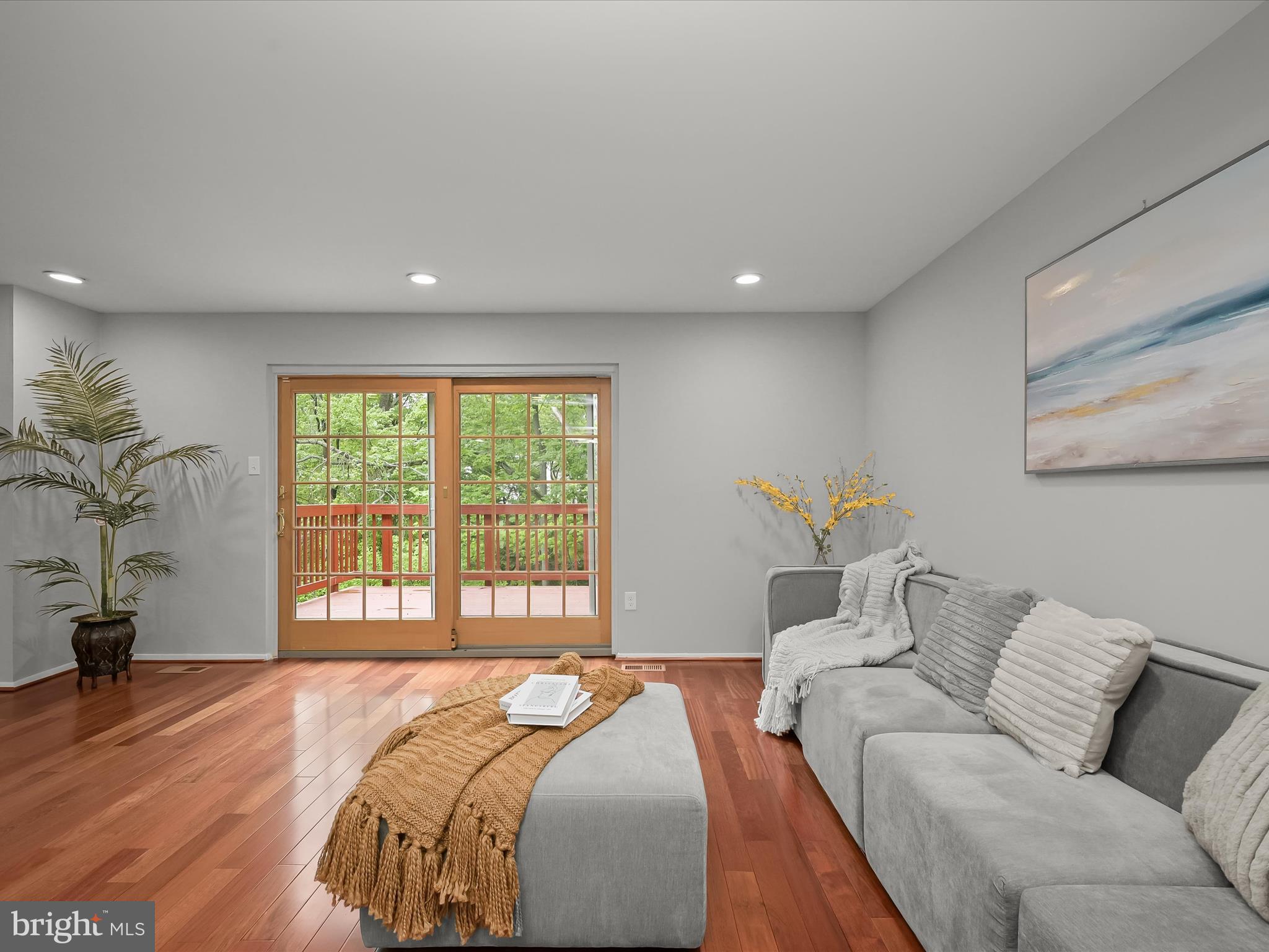 7106 Winter Rose Path Columbia, MD 21045 - Photo 13 of 50 a bedroom with a large bed couch and a large window