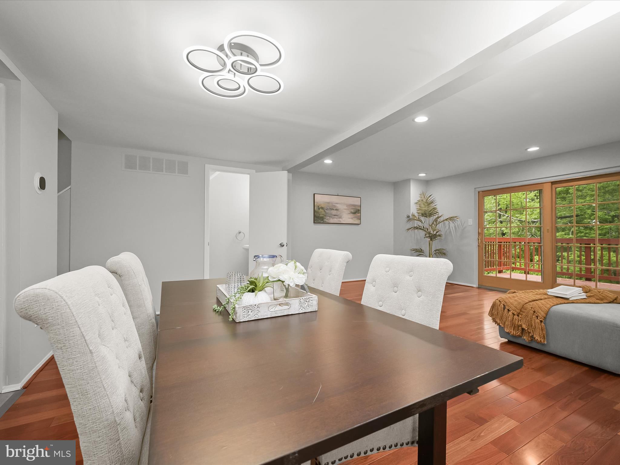7106 Winter Rose Path Columbia, MD 21045 - Photo 50 of 50 a view of a dining room with furniture window and outside view